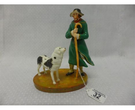 HANDPAINTED CERAMIC FIGURE GROUP Farmer with his Dog, set on oval base, height 18cms