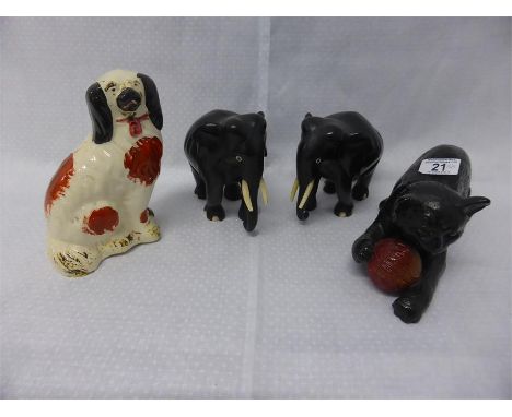 BRETBY CAT ORNAMENT, Staffordshire mantel dog and a pair of vintage carved wood elephants (4)