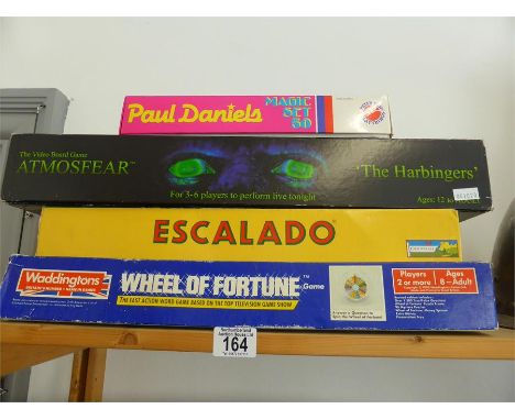 FOUR BOXED VINTAGE BOARD GAMES The Harbingers, Escalado, Wheel of Fortune and Paul Daniels Magic Set no. 50 (4)