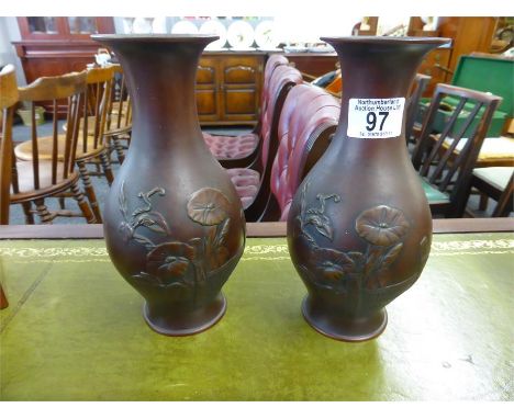 PAIR OF JAPANESE BRONZE EFFECT BALUSTER VASES with floral and bamboo detail in raised relief, height 23cms (2)