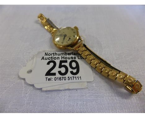 VINTAGE 9ct GOLD LADY'S VERITY WRISTWATCH with enamelled dial, subsidiary seconds dial and graduated link bracelet