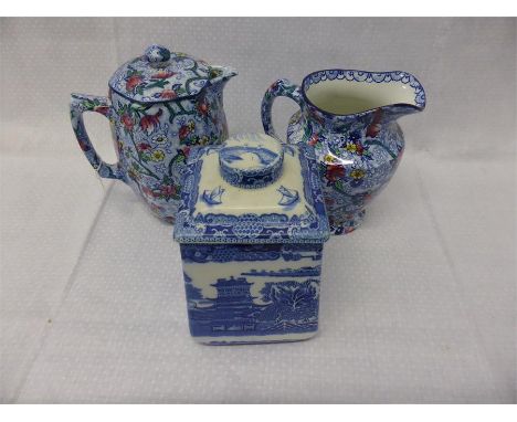 COLLECTION OF RINGTONS WARE comprising blue chintz teapot and cover, height 22cms, matching jug height 20cms, and a Willow Pa