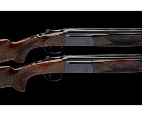 PERAZZI A PAIR OF 20-BORE 'MX20C' TRIGGERPLATE-ACTION OVER AND UNDER EJECTORS, serial no. 69263 and 69265, for 1987, 26in. ni