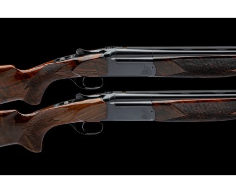 PERAZZI A PAIR OF 20-BORE 'MX20C' TRIGGERPLATE-ACTION OVER AND UNDER EJECTORS, serial no. 69263 and 69265, for 1987, 26in. ni