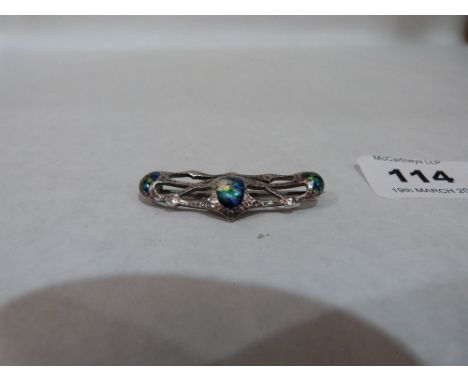 An Arts and Crafts silver and enamel brooch by Deakin + Francis. Birmingham 1908