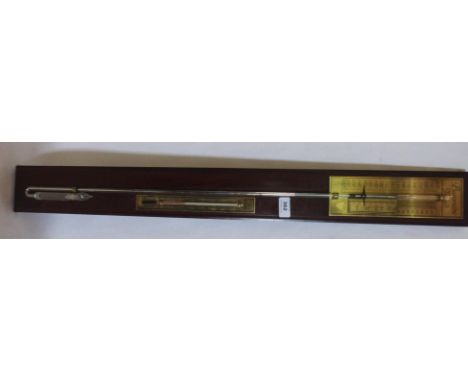 A mercurial barometer with thermometer register. 36' high