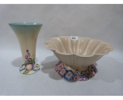 A Clarice Cliff Newport pottery bowl and flower vase. The bowl 9½' diam