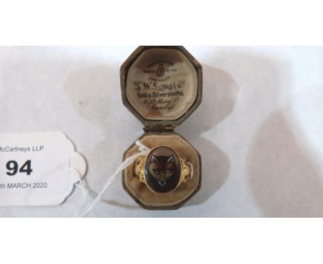 A ring marked 10K, set enamel fox head ring. Size Q½
