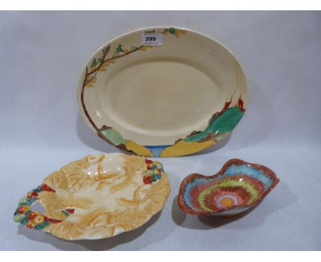 A Clarice Cliff Bizarre oval dish and two other items of Clarice Cliff ceramics