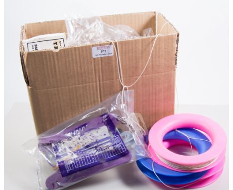 Box containing Bungee, tow lines, reels, wheel and timer.