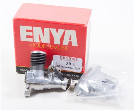 Two R/C glow engines, AP15 and ENYA 06, both NIB (2)