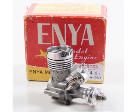Two O9 ENYA glow engines, one R/C, one CL, both NIB (2)
