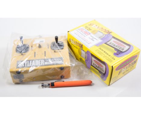 Plastic box containing SKYLEADER R/C set, Engine Starter, propeller  balancer and miscellaneous spares.