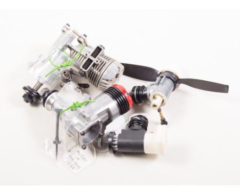Four Glow engines including two 049 COX, McCOY19, and FOX 29 R/C (4)