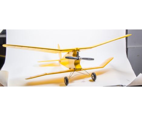 ED PENNY SLOT 2cc diesel, fitted to yellow VINTAGE BI-PLANE (broken tip).