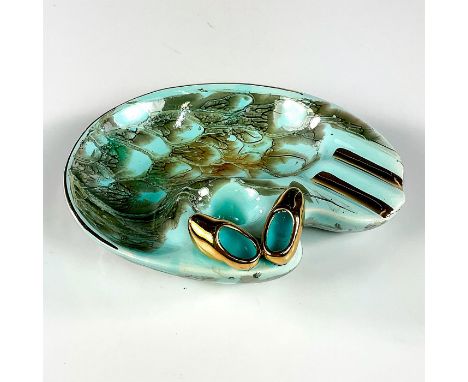 Turquoise toned with lustre finish &amp; branch patterning. Brass accented trim.Includes carved-in snuffer hole. Hand Painted