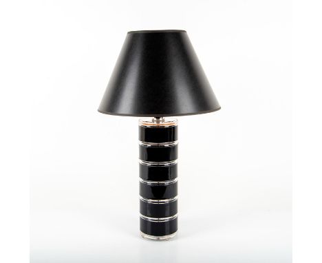 Beautiful minimalist lamp with clear and black lucite stripes and a black leather like shade. Measures 26"H including shade, 