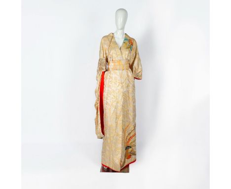 A beautiful gold-color kimono adorn with a golden cranes and embroidered phoenixes. Includes matching sash, obi, and small pu