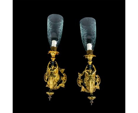 2 beautiful wall sconces depicting angels with arms reaching up to an acanthus shade holder. Includes 2 glass shades with etc