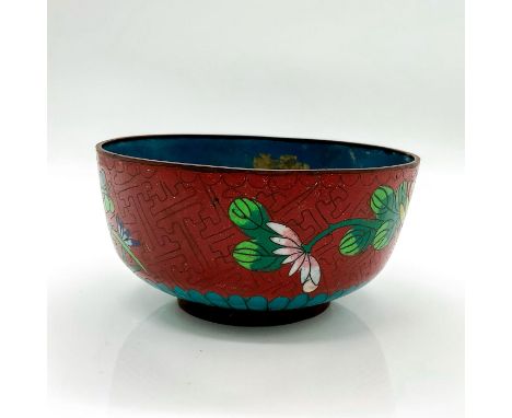 Hand decorated red enamel ground bowl with floral motifs in various coloration.This item has no reserve. Dimensions: 4.25"W x