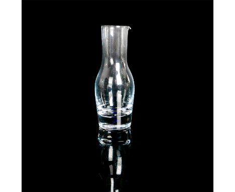 Small clear glass beverage carafe with cobalt blue accent within the base. Orrefors Sweden etched mark. Artist: Erika Lagerbi