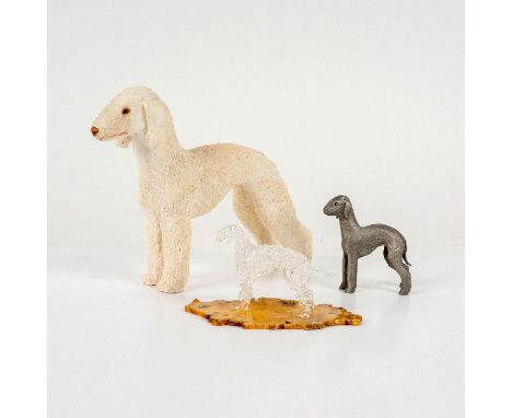 The largest white ceramic dog signed by the artist M. Wall and dated 1983 is 7"L x 6"H, silver tone metal dog is 3"H x 2.5"L,