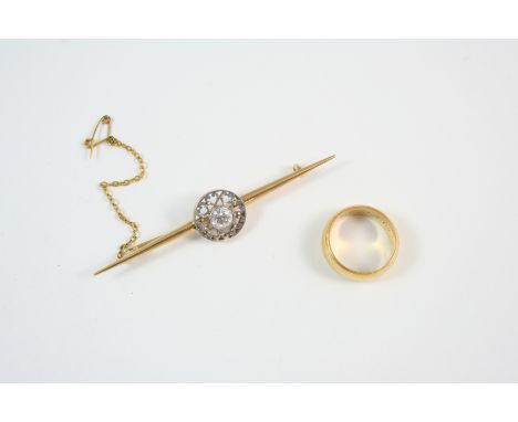 A DIAMOND AND GOLD BROOCH centred with an old brilliant-cut diamond in an openwork surround, 7.5cm. long, together with a 22c