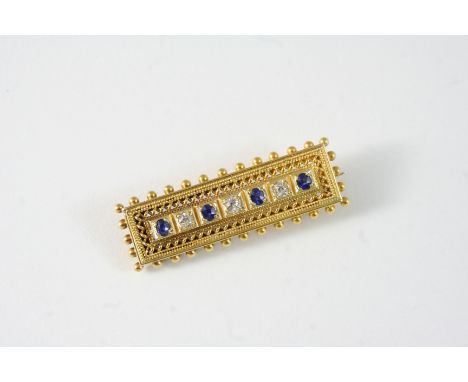 A SAPPHIRE AND DIAMOND BROOCH the gold openwork brooch is set with oval-shaped sapphires and cushion-shaped diamonds, 4cm. lo