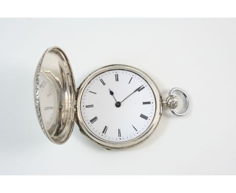 A SILVER FULL HUNTING CASED POCKET WATCH the white enamel dial with Roman numerals, the gilt metal cuvette engraved Duthene G