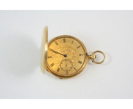 AN 18CT. GOLD FULL HUNTING CASED POCKET WATCH the gold foliate dial with Roman numerals and subsidiary seconds dial, with eng