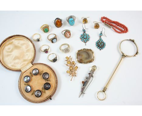 A BROWN LEATHER JEWELLERY BOX containing various items of jewellery, including, a cased set of mother-of-pearl and black onyx