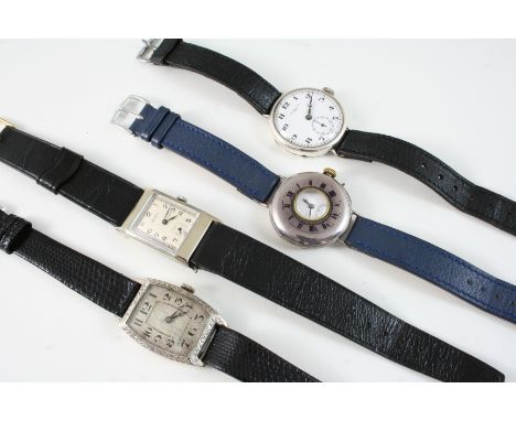 A SILVER HALF HUNTING CASED WRISTWATCH the outer case with blue enamel Roman numerals and plain white enamel dial, the inner 