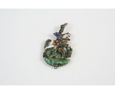 AN AUSTO-HUNGARIAN ENAMEL PENDANT depicting St. George and the Dragon, 3.5cm. high.