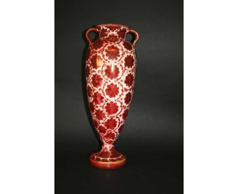 LARGE RUBY LUSTRE VASE in the manner of William De Morgan, with a floral design and ruby lustre glaze. Unmarked, 17 1/2ins (4