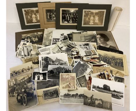 A box of assorted vintage black and white photographs.  To include: portraits, images of cars, trains &amp; motorbikes, team 