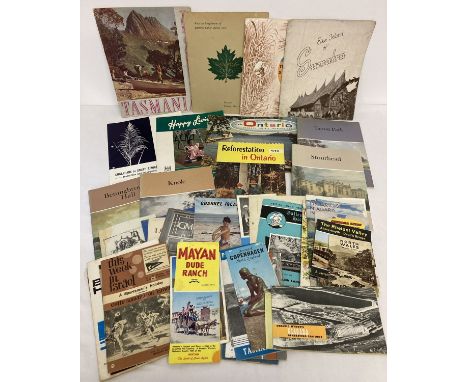 A collection of vintage tourist and travel guides and books.  Mostly 1950's and 60's. 
