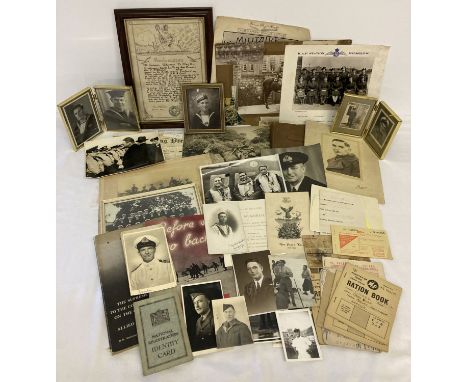 A collection of assorted military ephemera and photographs.  To include ration books, booklets, certificate and army and nava