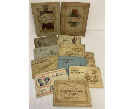 A collection of Players and Will's vintage cigarette card albums containing sets of cards.  Sets include Film Stars, Radio Ce