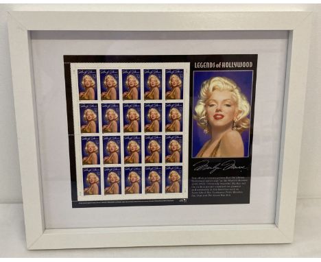 A framed &amp; glazed complete pane of unused American 1995 Legends Of Hollywood Marilyn Monroe stamps.  Pane includes larger