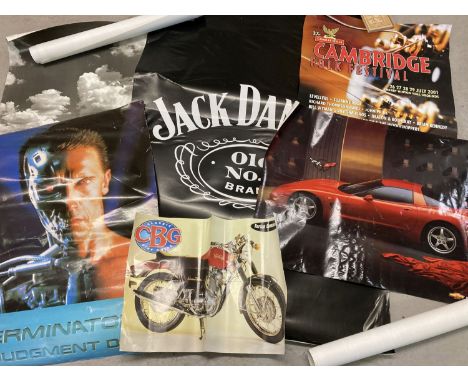 A collection of vintage and modern posters to include: Jack Daniels, cars, Cambridge Folk Festival.  In various sizes. 