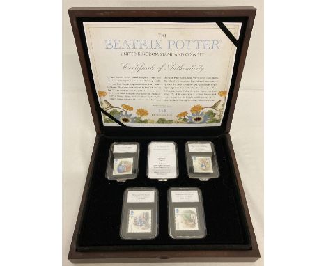 A Limited Edition Beatrix Potter stamp and coin wooden presentation box, limited to 495 pieces.  Box contains: 2 x 1st Class 