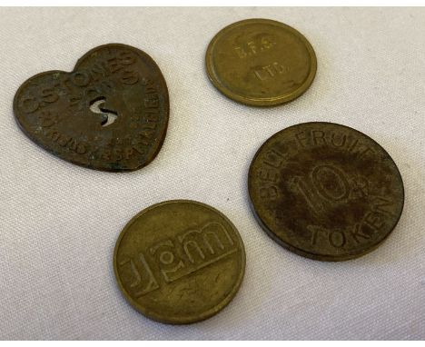 4 vintage tokens. To include heart shaped C. Stones &amp; sons Covent Garden.  Together with a JPM brass token, B.F.S. brass 