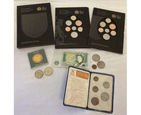 A collection of assorted coins and bank note, some sealed and unopened.  To include: Royal Mint Royal Shield of Arms uncircul