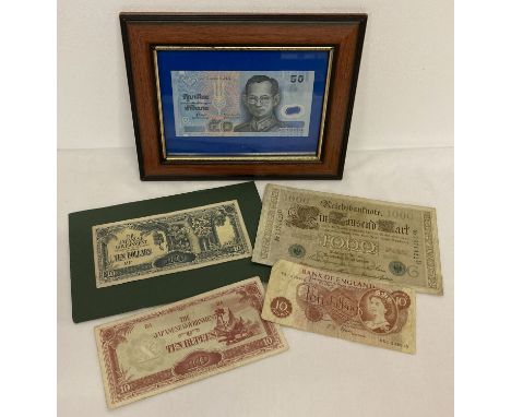 A small collection of vintage bank notes, one framed and glazed.  Comprising: framed 1996 Special Issue 50 Baht note issued t