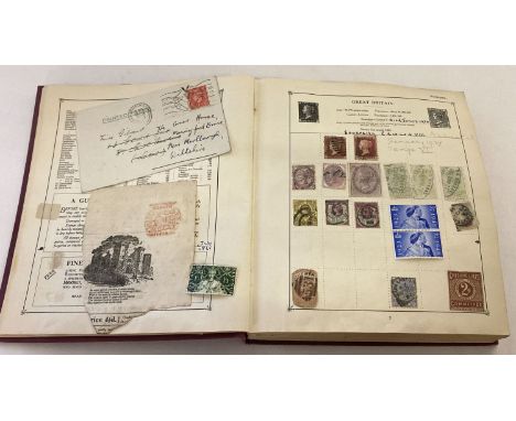 A vintage The Strand stamp album containing a British and world Victorian and vintage stamps.  To include penny red, jubilee 