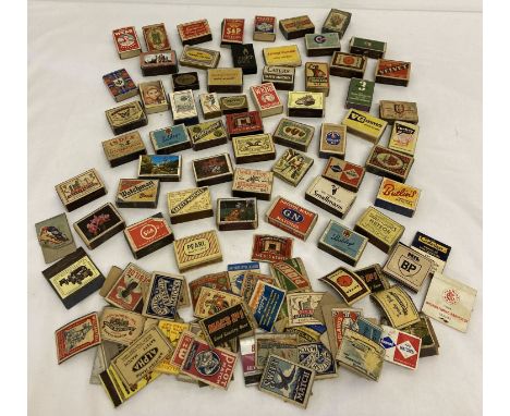 A collection of vintage matchboxes, match books and match box fronts.  