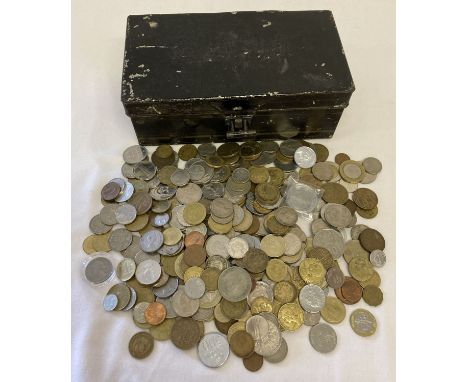 A black metal cash tin containing vintage British and foreign coins.  Foreign coins to include: USA, France, Belgium, Spain, 