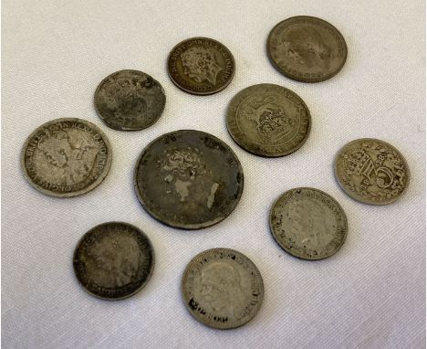 A collection of silver and half silver antique and vintage coins.  Sovereign heads of George IV, Edward VII and George V. To 