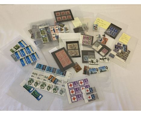 A small collection of vintage British and British territories stamps.  To include a block of 6 George V penny stamps and 2 Ge