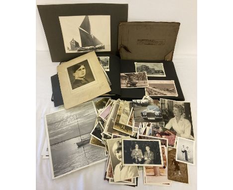 A box of assorted vintage photographs to include albums.  